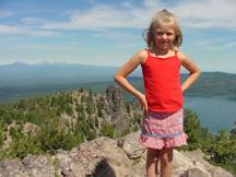 Summer standing at the tip top of Paulina Peak